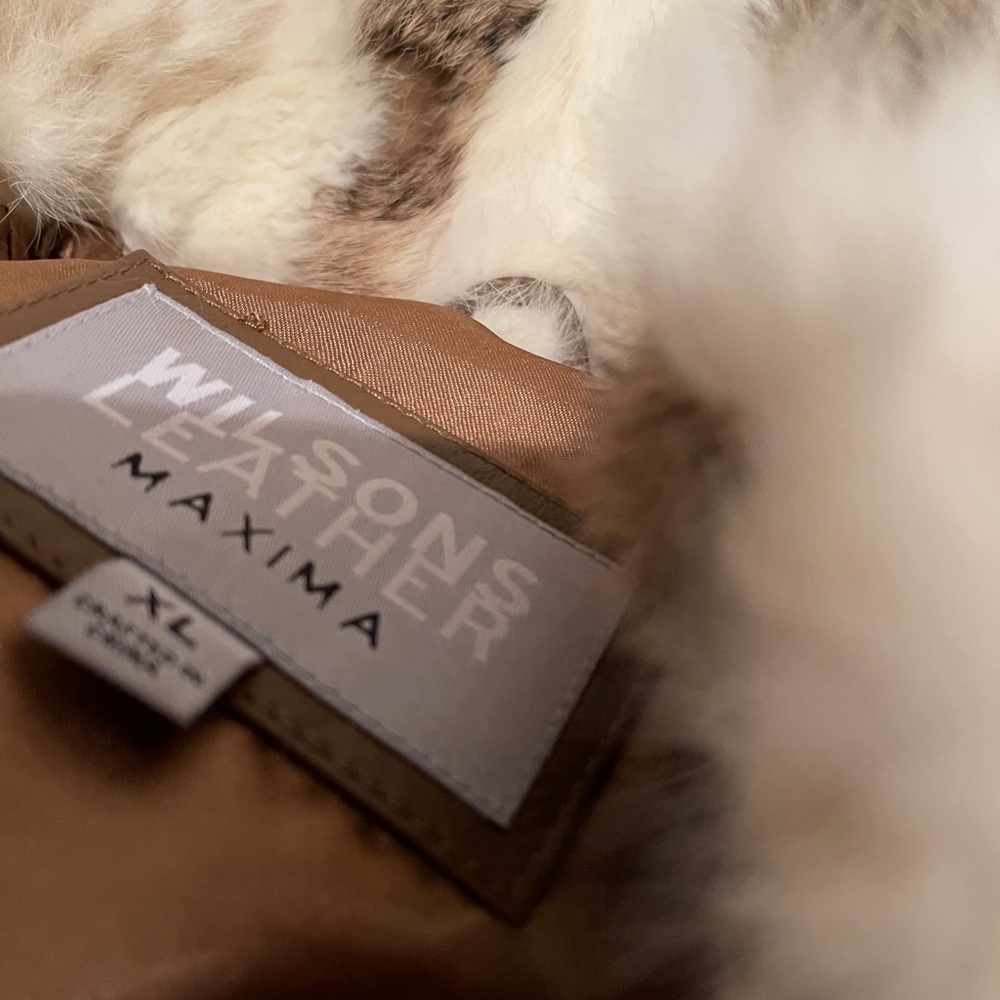 Brown and white rabbit fur coat